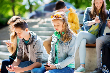 Sticker - teenage friends with smartphones outdoors