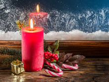 Christmas Candle, Fir Branch, Candy Canes And Frozen Window On B