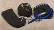 © Olvita - the process of knitting wool slippers gray yarn on a circular loom
