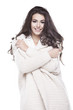 © dorriss - Beautiful young woman in warm sweater on a white background