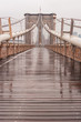 Brooklyn Bridge with no people on a rainy day