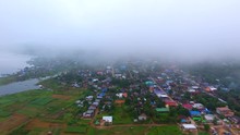 Aerial View Of Sangkhlaburi, Kanchanaburi Of Thailand, Fog Floating On The River In The Early Morning