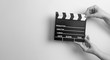 © Myvisuals - movie marker or clapper board set against a colorfull background
