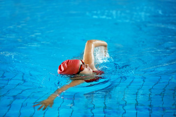 Girl swimming in pool