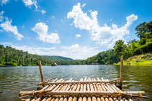 Bamboo Raft Heading On Lake