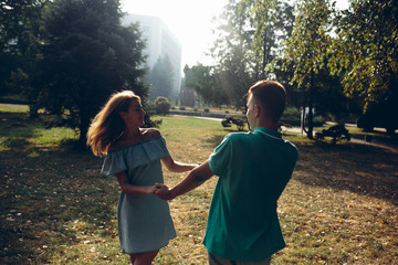 Wall Mural - man and woman in the park