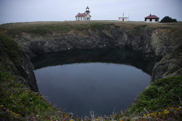 Wall Mural - lighthouse n water hole