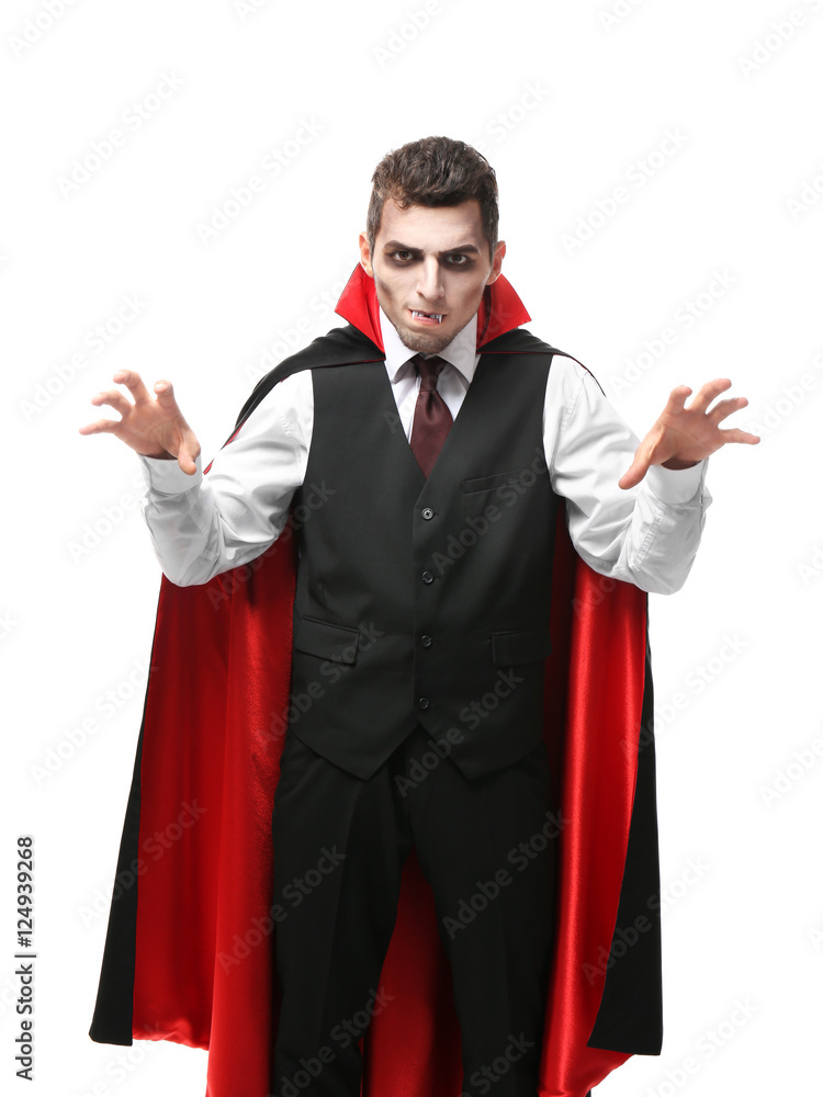 Young man dressed in vampire costume for Halloween, isolated on white