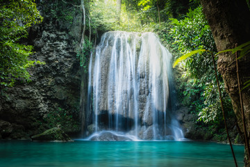 Wall Mural - Erawan waterfall, the beautiful waterfall in deep forest at Erawan National Park - A beautiful waterfall on the River Kwai. Kanchanaburi, Thailand