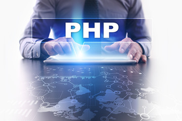 Wall Mural - businessman is using tablet pc, pressing on virtual screen and selecting php.