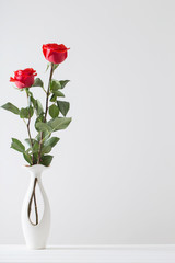 bouquet of red roses in vase