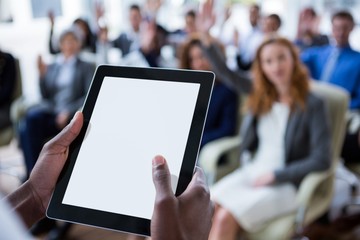 Wall Mural - Businessperson using digital tablet during meeting