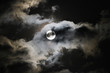 Full Hunter's Moon with clouds, eerie or spooky full moon for Halloween or fall