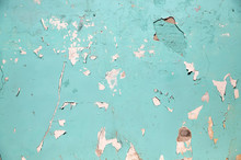 Blue Or Turquoise Wall With Peeling Paint Surface