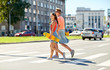 © Syda Productions - teenage couple with skateboards on city street