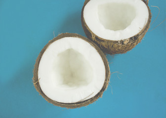 Fresh coconut on a light blue background