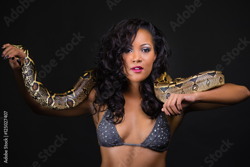 Black Woman with Snake - Buy this stock photo and explore similar images at  Adobe Stock | Adobe Stock