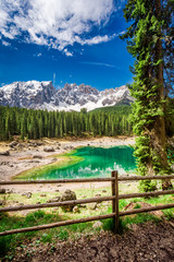 Wall Mural - beautiful view to mountain carezza lake in spring, alps, italy