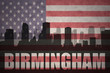 abstract silhouette of the city with text Birmingham at the vintage american flag