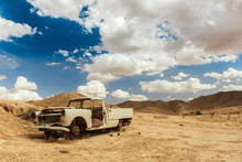 Desert Relic. Old Car Rusting Away In The Desert