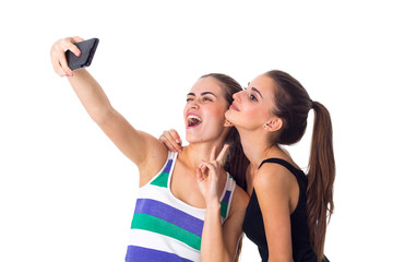 Two young women making selfie