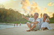 © aletia2011 - elderly couple rest at tropical beach