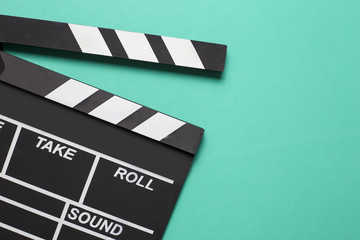 movie clapper on green background