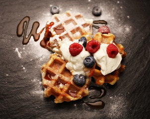 Wall Mural - Fresh homemade waffles with ricotta served with whipped cream and berries