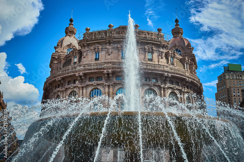 Fotografia, Obraz "Palazzo della Borsa" and great fountain at central Place in Genoa / Historical