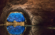 Rock Wall Reflected In  The Largest Underground Lake In Europe.