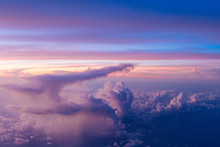 Aerial View From Airplane Flying Above The Clouds , Twilight Tme