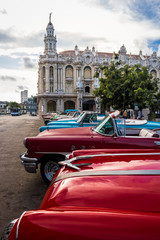 Sticker - Cuban colorful vintage cars in front of the Gran Teatro - Havana, Cuba