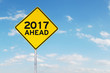 © Creativa Images - Road sign with number 2017 and ahead
