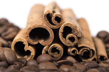 cinnamon sticks spice and coffee beans isolated on white background