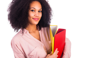 Portrait Of Young African student woman posing over white backgr