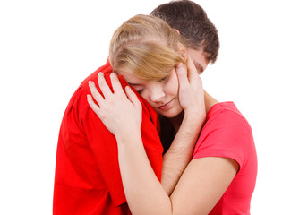 Couple. Woman is sad and being consoled by his partner