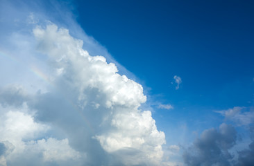 Wall Mural - white fluffy clouds in the blue sky