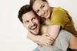 © sanneberg - Beautiful piggyback couple, smiling