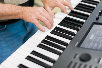 Keyboard player performing on stage