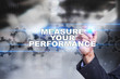 © WrightStudio - Businessman is drawing on virtual screen. measure your performance concept.