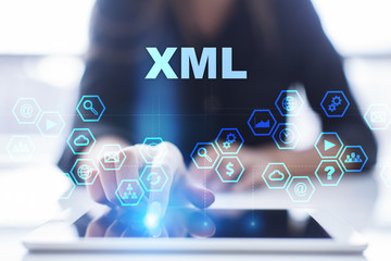 Wall Mural - Woman is using tablet pc, pressing on virtual screen and selecting xml