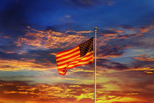 American Flag In Front Of Bright Sky