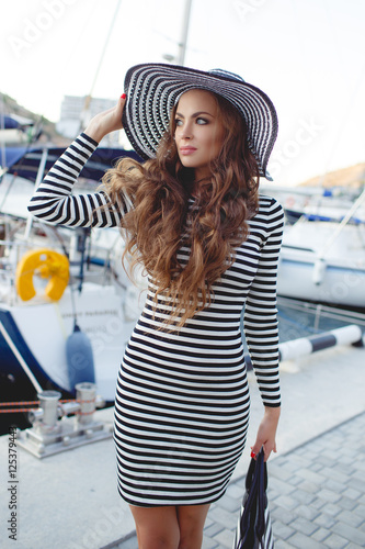 Beautiful Young Woman With Long Curly Hair On His Head Wearing A