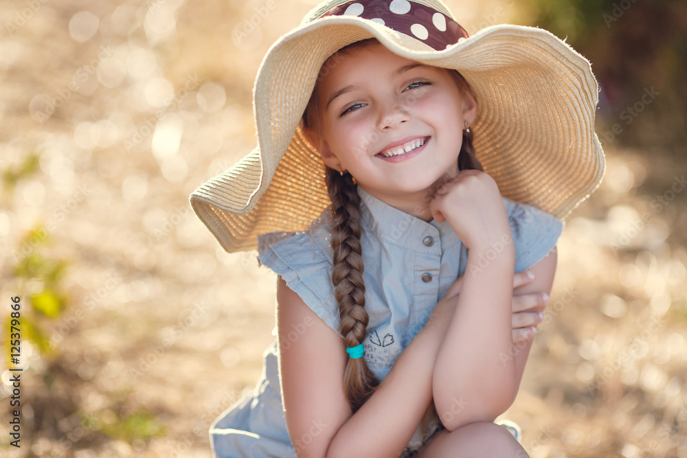 Cute little girl 6 years old,hair braided in two braids,on his head a ...