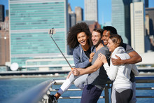Group Of Friends Taking Selfie Picture, Manhattan In Background