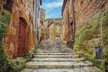 Fototapete - Alley in old town Pitigliano, Tuscany, Italy