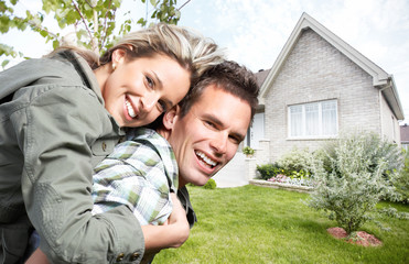 Poster - Happy couple near new house.