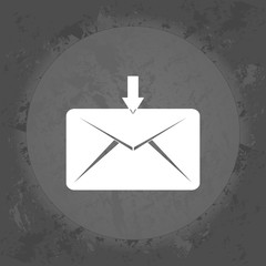 Incoming message letter sms icon on gray vintage background.