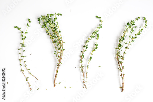 Fotomural fresh thyme top view on white background