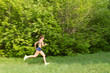 © lokisurina - Young sports girl running, jogging